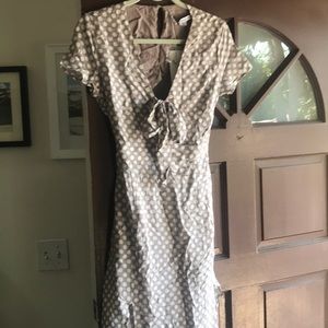 Tan and white polka dot high slit dress